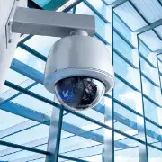 Security cameras (surveillance cameras) installed on buildings. An example where a semiconductor made from a silicon wafer is used in the image sensor.
