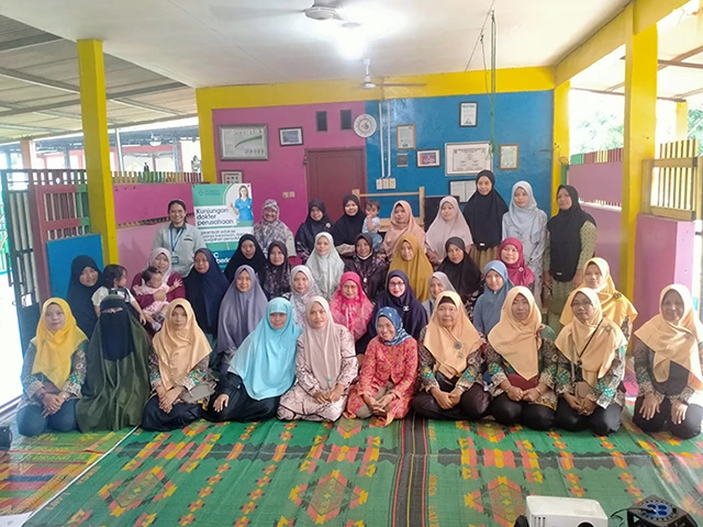 Group photo of participants following a hygiene education session at PT. SUMCO Indonesia.